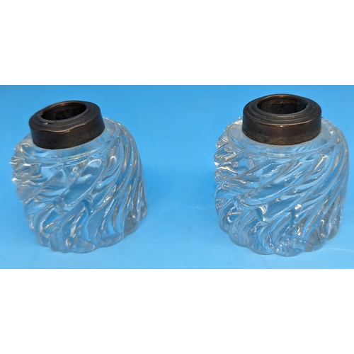 254 - A pair of Edwardian heavy glass candlestick holders