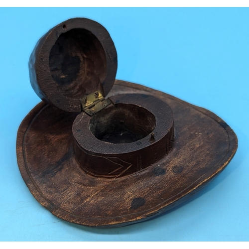 260 - A carved Maplewood hat inkwell