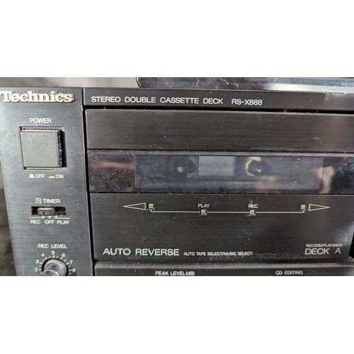 878 - Technics Double cassette deck with remote.