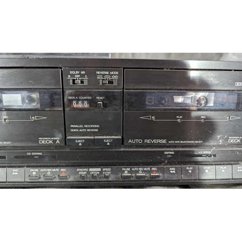 878 - Technics Double cassette deck with remote.