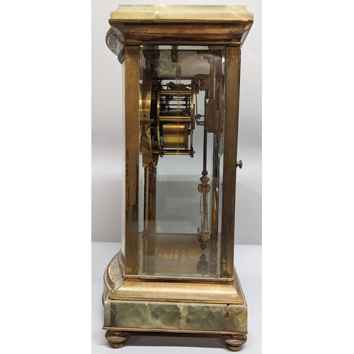 78 - An Onyx, Enamel and Brass mantle clock - Enscribed - Presented to ENGr. Cleark Qr Mr Serjt - J Mc Ro... 