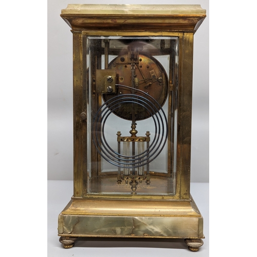 78 - An Onyx, Enamel and Brass mantle clock - Enscribed - Presented to ENGr. Cleark Qr Mr Serjt - J Mc Ro... 