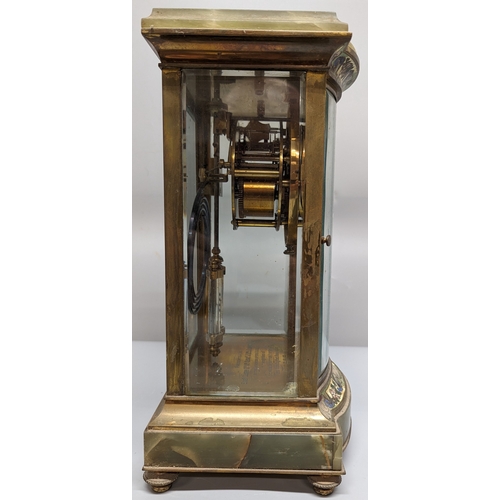 78 - An Onyx, Enamel and Brass mantle clock - Enscribed - Presented to ENGr. Cleark Qr Mr Serjt - J Mc Ro... 