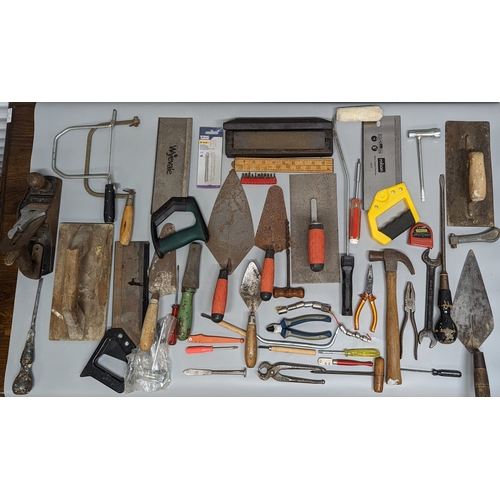 981 - A box of tools including hammers, spanners and more