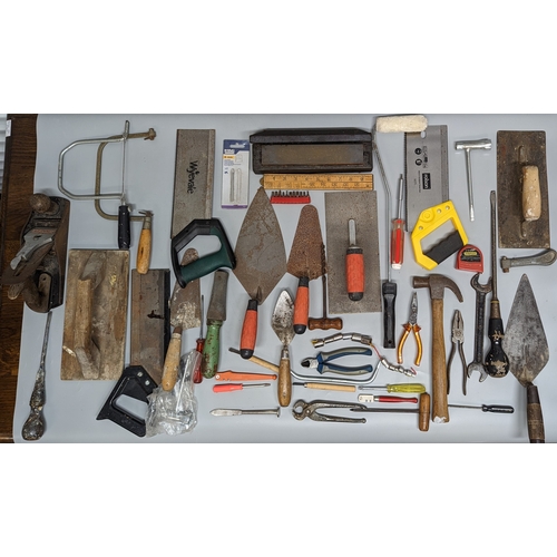 981 - A box of tools including hammers, spanners and more