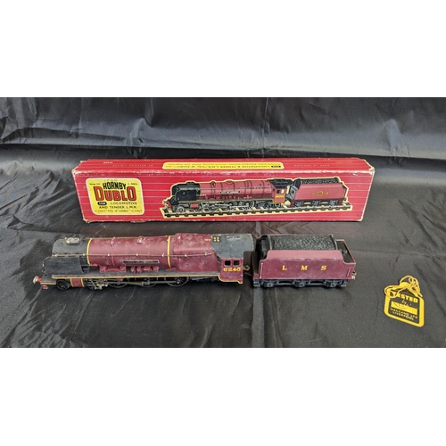 638 - A Hornby Dublo 2226 'City of London' 00 Locomotive and tender with instructions