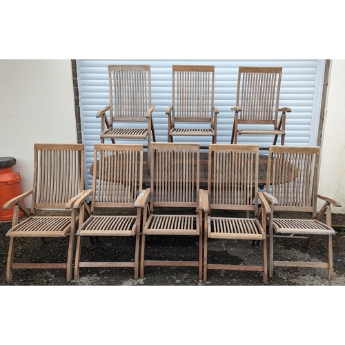 930 - Large folding Teak garden table and 8 folding Teak chairs made by Pagoda