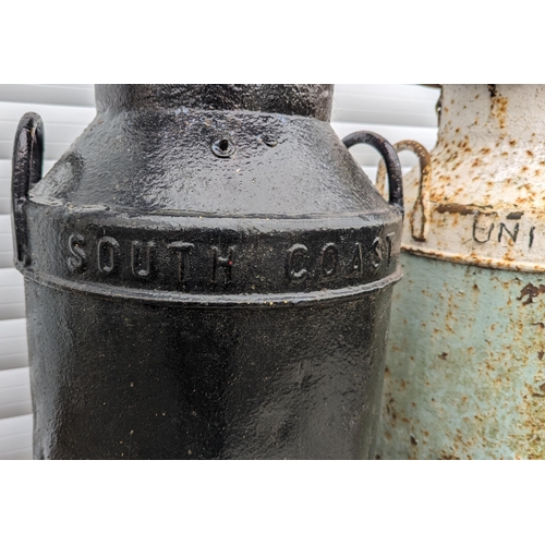 933 - 3 Milk churns - 
Black - South Coast Dairies
Blue and White - United Dairies 
Galvanised - United Da... 