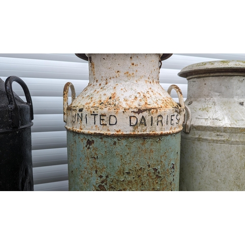 933 - 3 Milk churns - 
Black - South Coast Dairies
Blue and White - United Dairies 
Galvanised - United Da... 