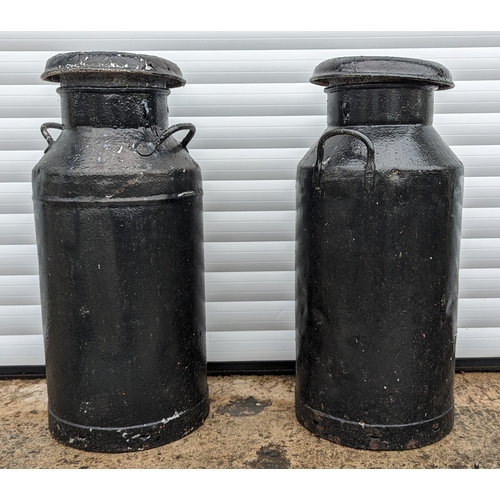 935 - 2 Black painted milk churns - 76 x 31 x 31cm