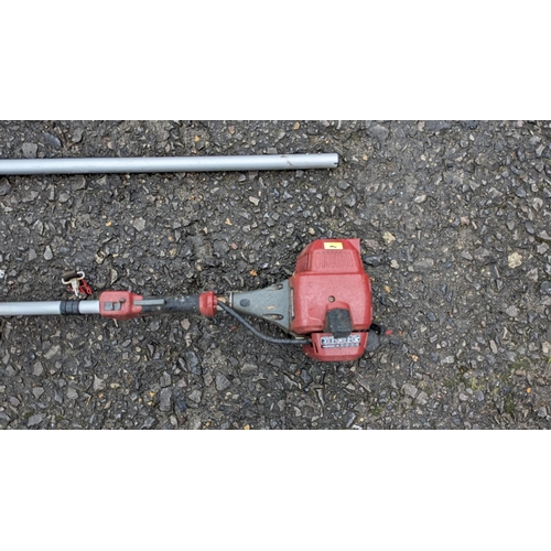 1007 - Petrol Mountfield multitool - brush cutter strimmer, chainsaw, hedge cutter