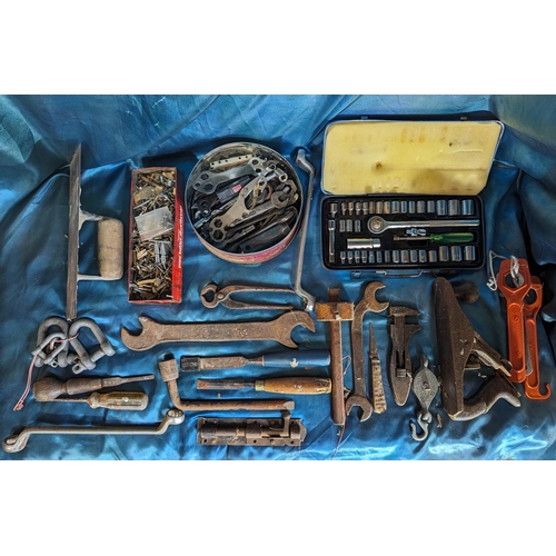 1028 - A box of mixed tools including spanners, 40 piece socket set and much more