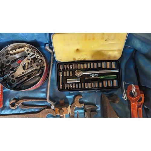 1028 - A box of mixed tools including spanners, 40 piece socket set and much more