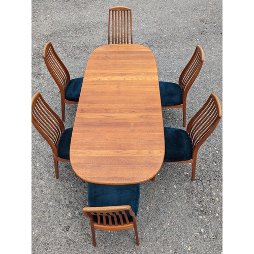 12 - Danish Glastrup teak table and 6 Chairs finish with teal seat covers - 73 x 140(closed) x 224 (open)... 