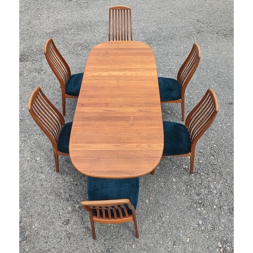 12 - Danish Glastrup teak table and 6 Chairs finish with teal seat covers - 73 x 140(closed) x 224 (open)... 