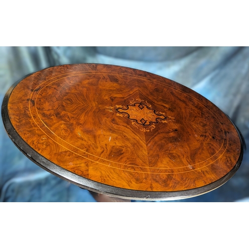 552 - Oval inlaid table on tripod carved base - 70 x 63 x 44cm