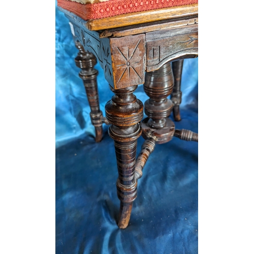 553 - Antique carved stool with turned legs