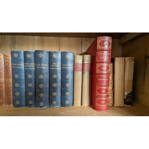 605 - An assortment of Antique books:- The Miracle of England, The adventures of Hajji Baba, Dickens, Dail... 