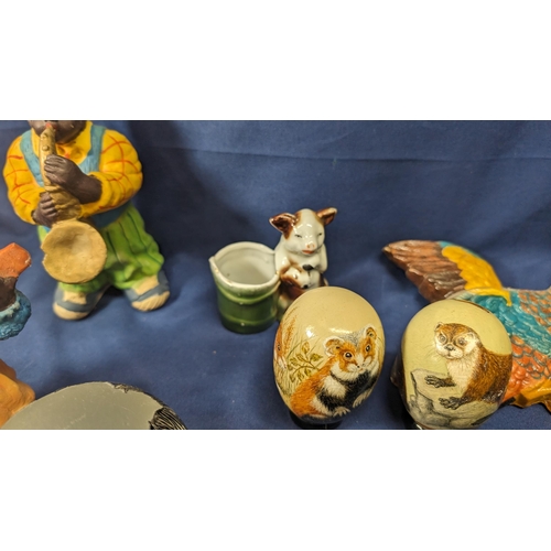 741 - A collection of vintage items including - carved wooden and hand painted eggs, geese, zebra paperwei... 