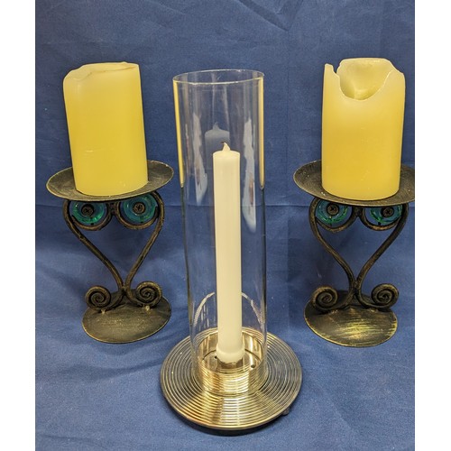 855 - 2x Church candle holders on brown/gold base PLUS candle holder with silver coloured base and glass s... 