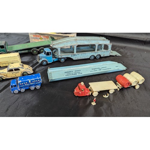 611 - An Assortment of Playworn Dinky, Matchbox and Lesney Die Cast Metal Cars and Trucks, Fodea Flatbed 9... 