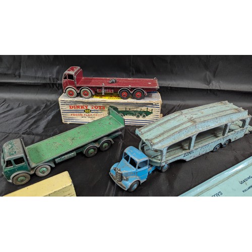 611 - An Assortment of Playworn Dinky, Matchbox and Lesney Die Cast Metal Cars and Trucks, Fodea Flatbed 9... 