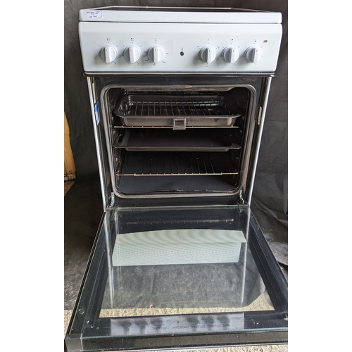 1044 - Indesit Cooker 90cm x 50cm x 65cm