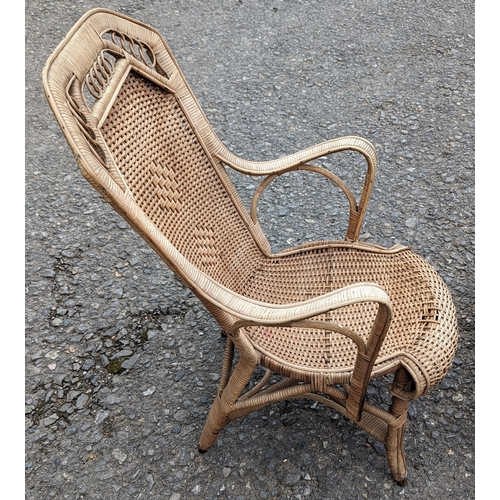 447 - Rattan Rocking Chair and a Cane Arm Chair