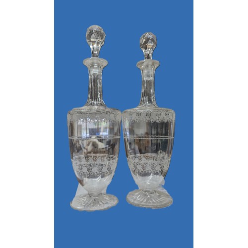 16 - A pair of etched glass decanters