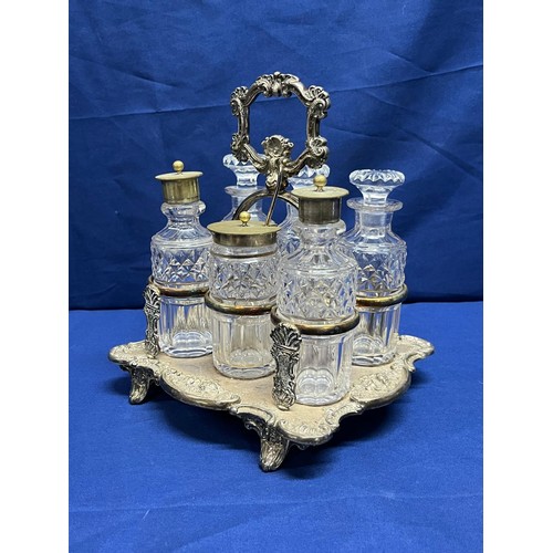 33 - A cut glass and silver-plate cruet