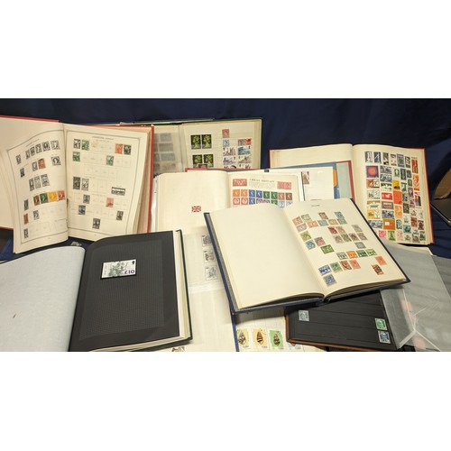 499 - A huge selection of stamps in School Boy Albums with Worldwide, Commonwealth, Channel Islands and mo... 