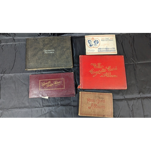 870 - An Assortment of Cigarette and Postcard Albums