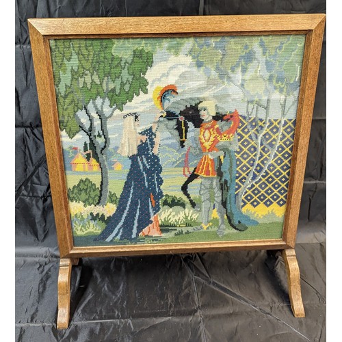 1179 - A tapestry firescreen depicting a knight and lady