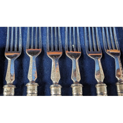 513C - A Cased Set of Cutlery