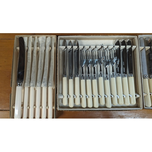 297C - A Quantity of Cutlery in Box and Case