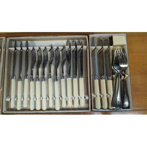 297C - A Quantity of Cutlery in Box and Case