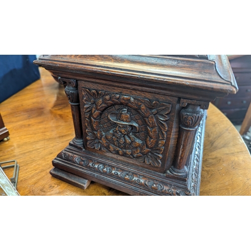 175B - A Heavily carved Edwards & Roberts Ballot/Postal Box depicting Roundheads and Cavaliers