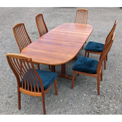 12 - Danish Glastrup teak table and 6 Chairs finish with teal seat covers - 73 x 140(closed) x 224 (open)... 