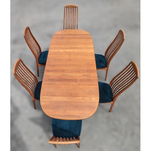 12 - Danish Glastrup teak table and 6 Chairs finish with teal seat covers - 73 x 140(closed) x 224 (open)... 