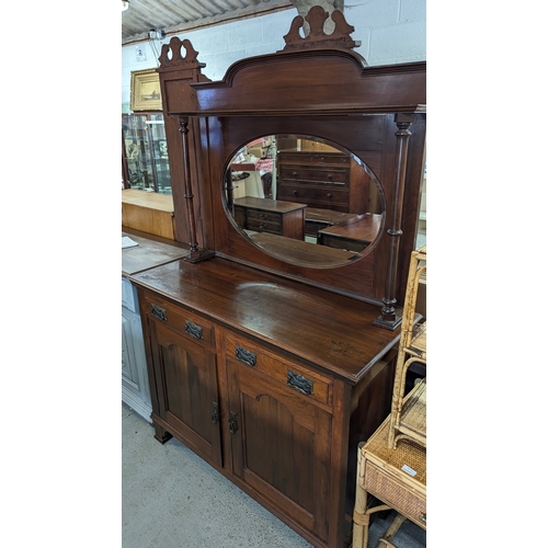 24 - An Edwardian mirror backed sideboard - 122 x 50 x 150cm