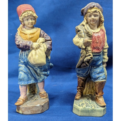 57 - A pair of Bruders Urbach Majolica figures (some repairs to bases as pictured)