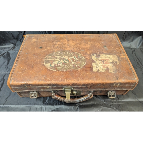 123 - A Vintage Leather Travel Case