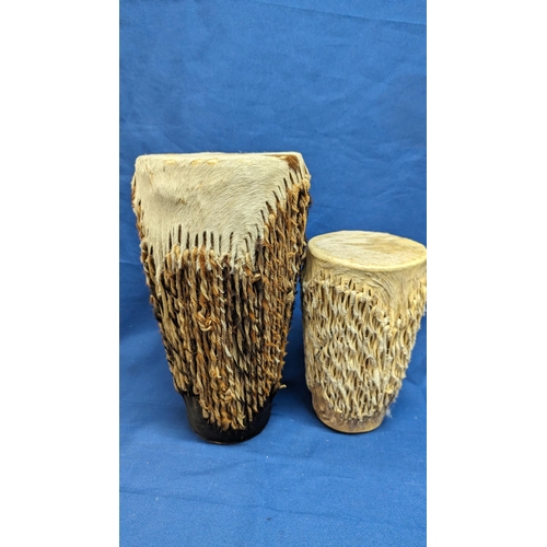 137 - Vintage African handmade Bongo's x2 including: 1x Zebra hide (31cm tall) and 1x Cow/Goat hide (22cm ... 