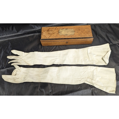 166 - A Pair of Victorian White Kid Leather Gloves and Glove Box.   From the country estate.