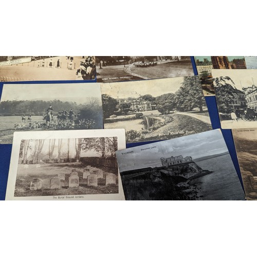 177 - A collection of antique postcards including Singapore, Ceylon, Yeovil etc.