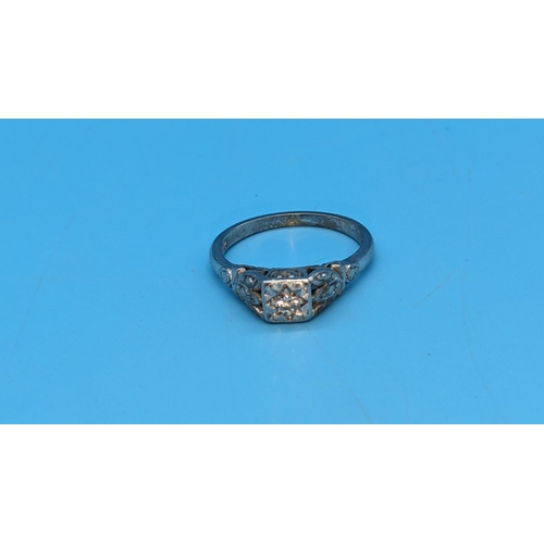 207 - A Diamond and 18ct White Gold Ring. Size N/O. 4gms Total Weight.