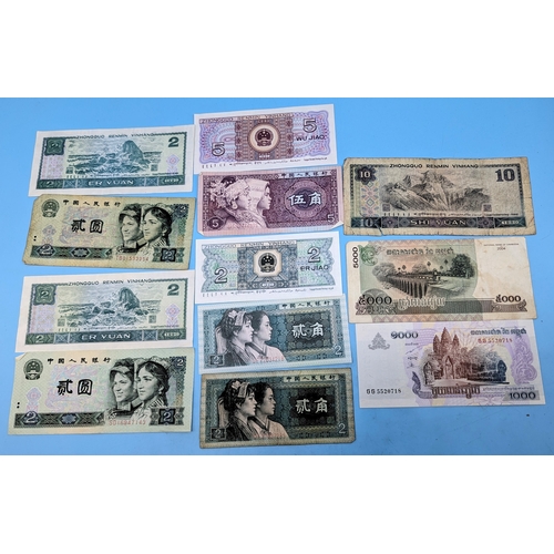 239 - An assortment of Chinese and Cambodian Bank notes