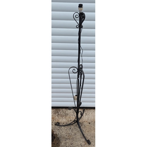 325 - A metal standard lamp - 137cm tall