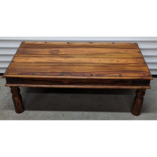 401 - Wooden coffee table with metal banding and studs - 40 x 110 x 60cm