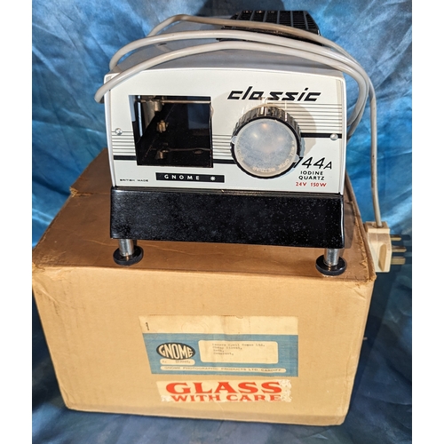 1186 - Gnome Classic 744A projector in original packaging -